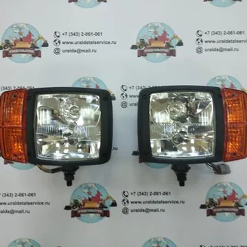 Фара основного освещения UDS-009 (JCB, Case, John Deere, Komatsu) Нижнее крепление