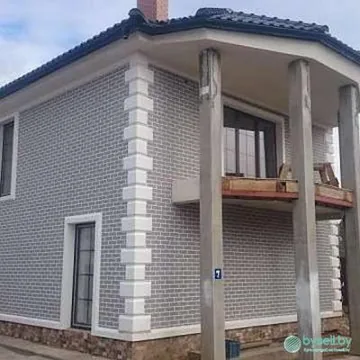 Утеплене фасад-цоколь Термопанели Одежда дома