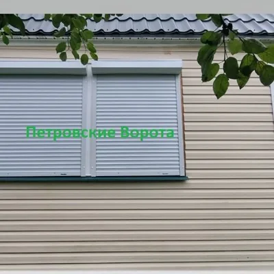 Секционные ворота и рольставни от компании Петровс
